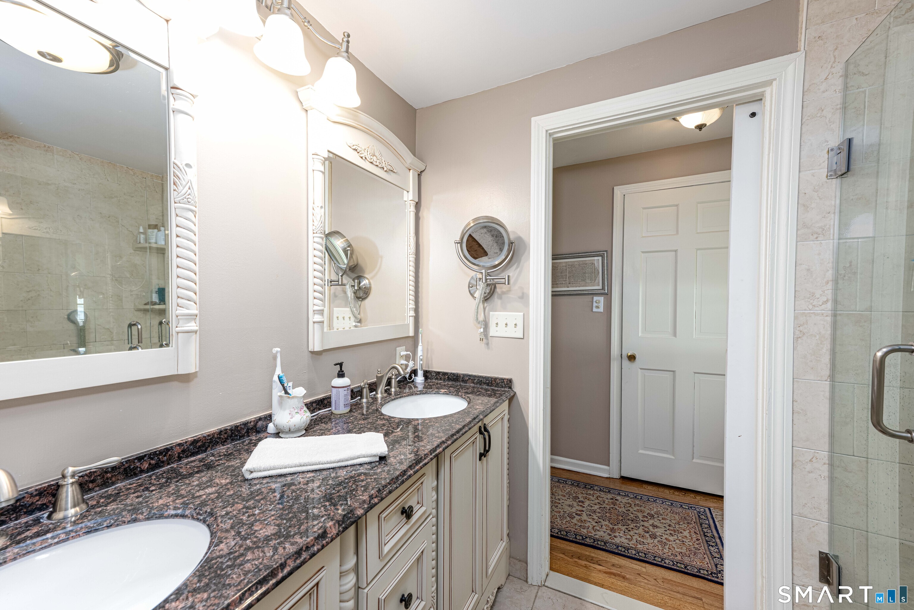 118 Rolling Ridge Road Hamden, CT 06518 - Photo 13 of 21 a bathroom with a granite countertop sink and a mirror