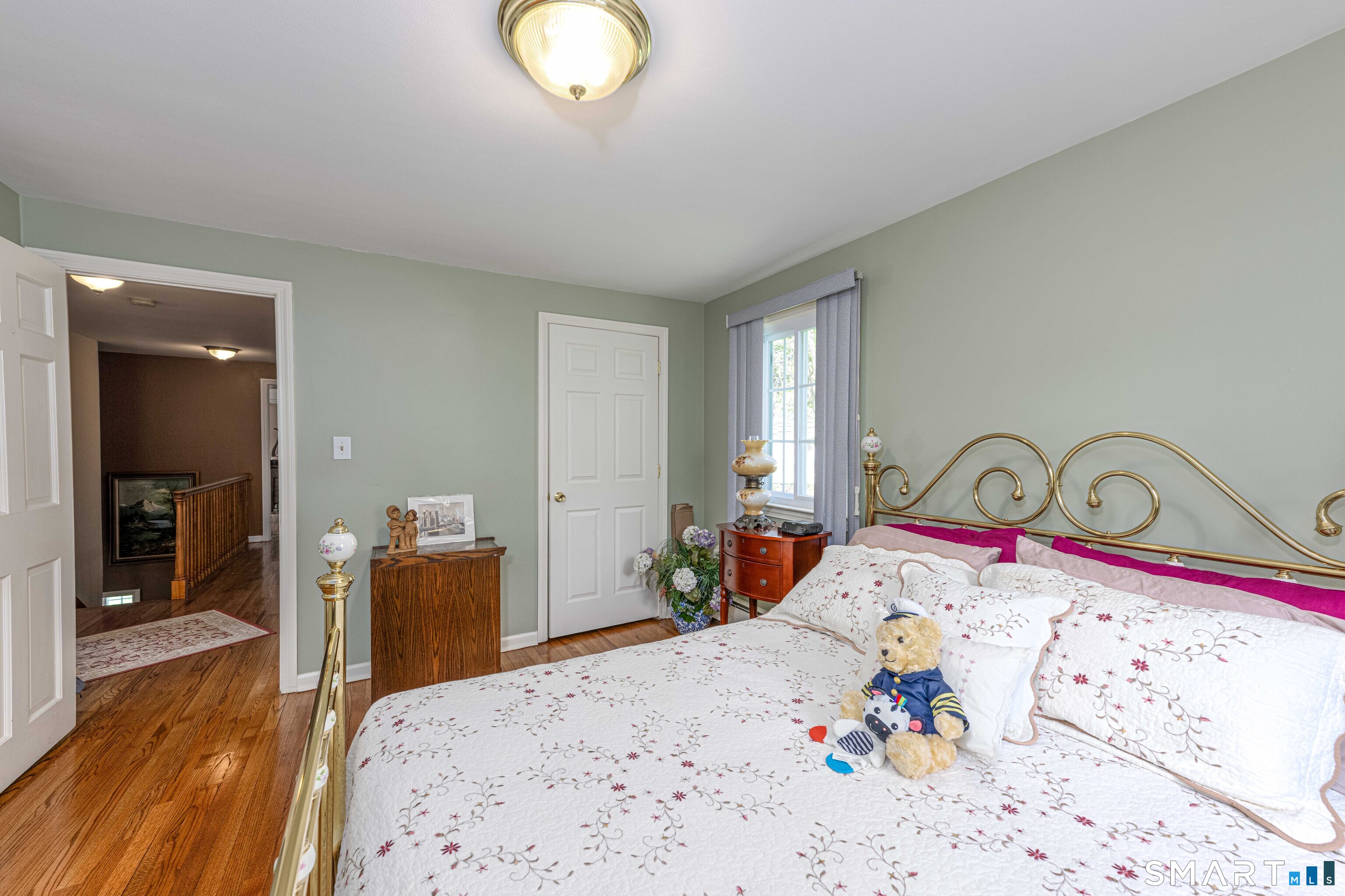 118 Rolling Ridge Road Hamden, CT 06518 - Photo 16 of 21 a bedroom with a bed and a dresser