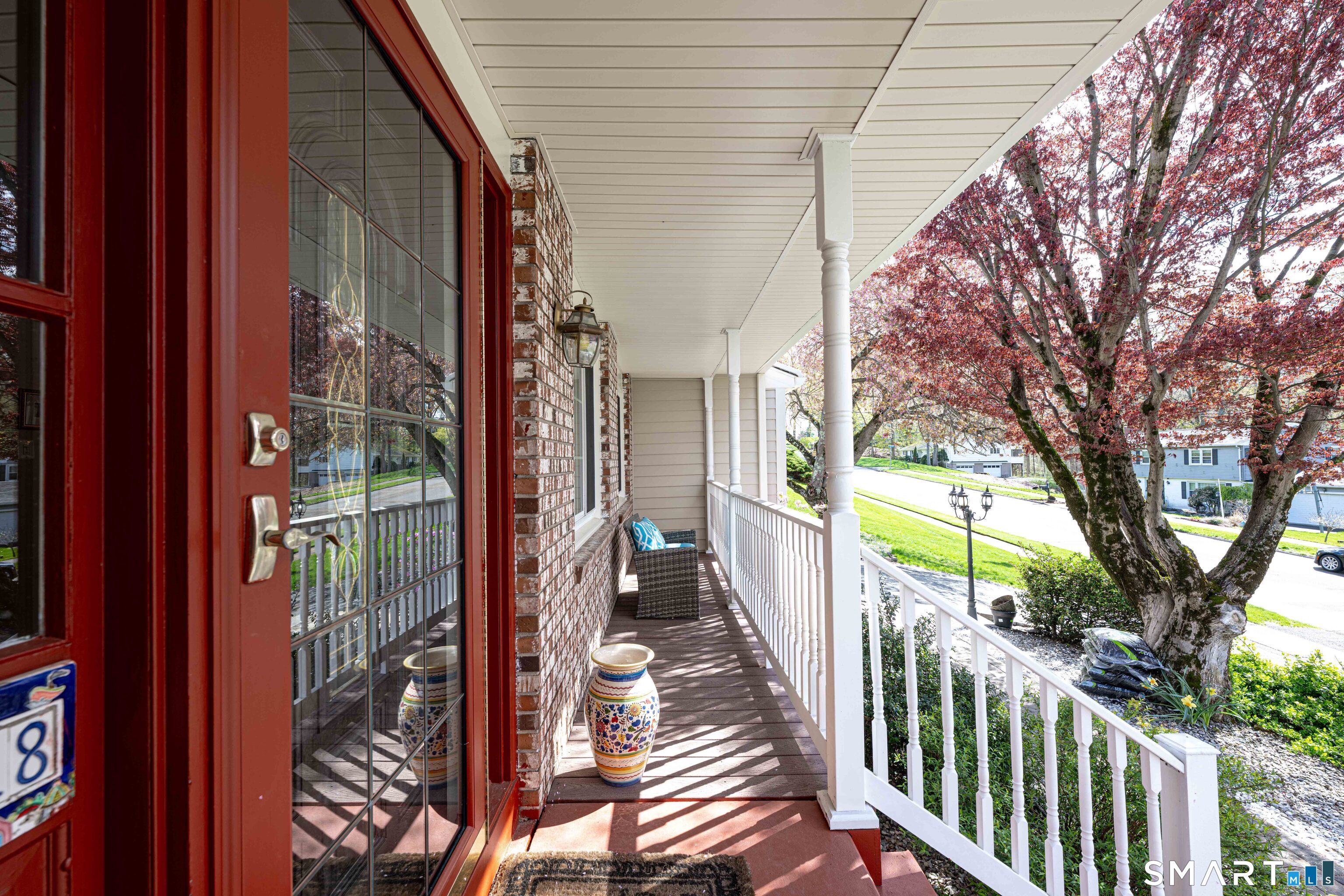 118 Rolling Ridge Road Hamden, CT 06518 - Photo 2 of 21 a view of a house with a balcony