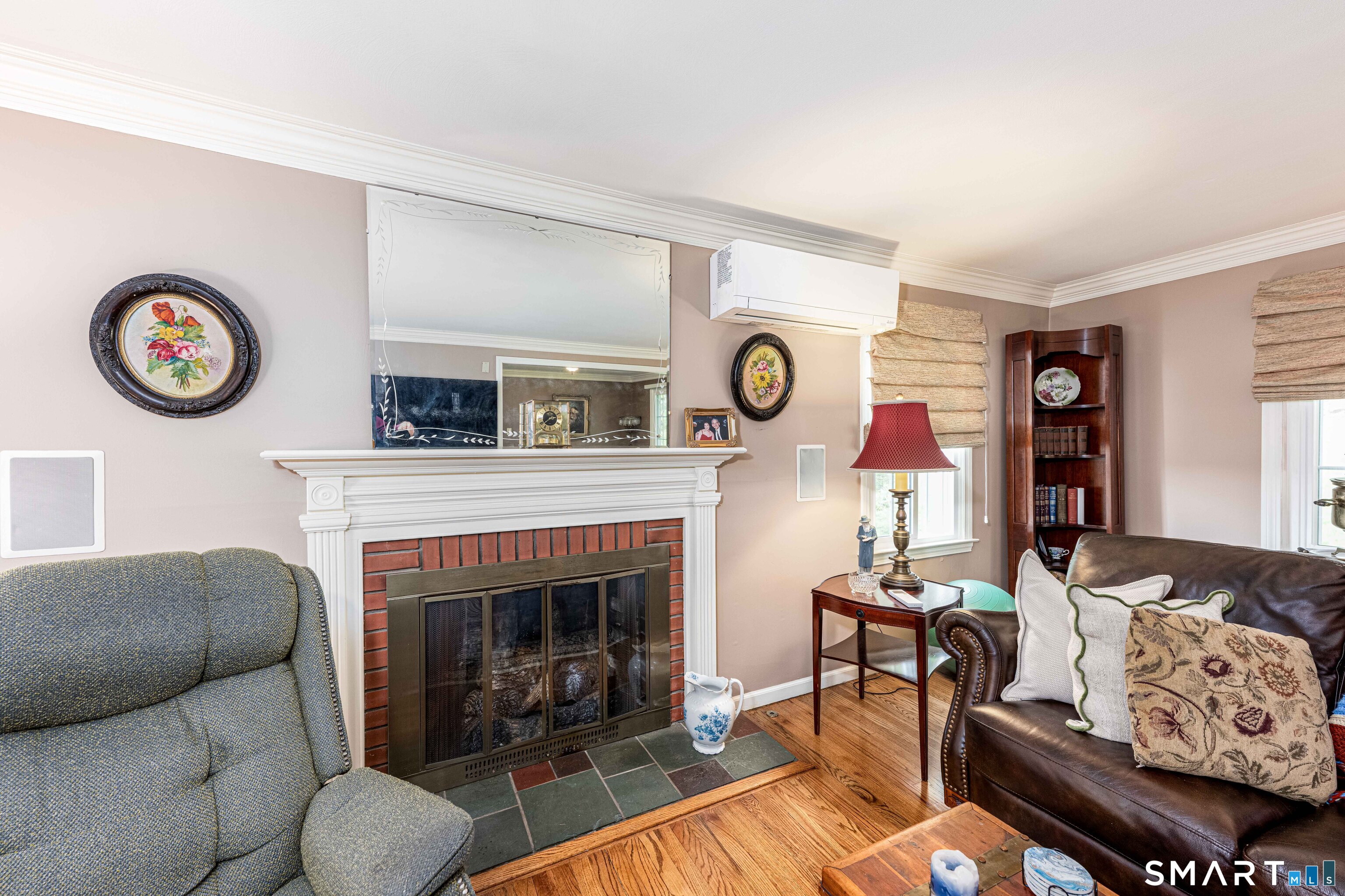 118 Rolling Ridge Road Hamden, CT 06518 - Photo 6 of 21 a living room with furniture and a fireplace