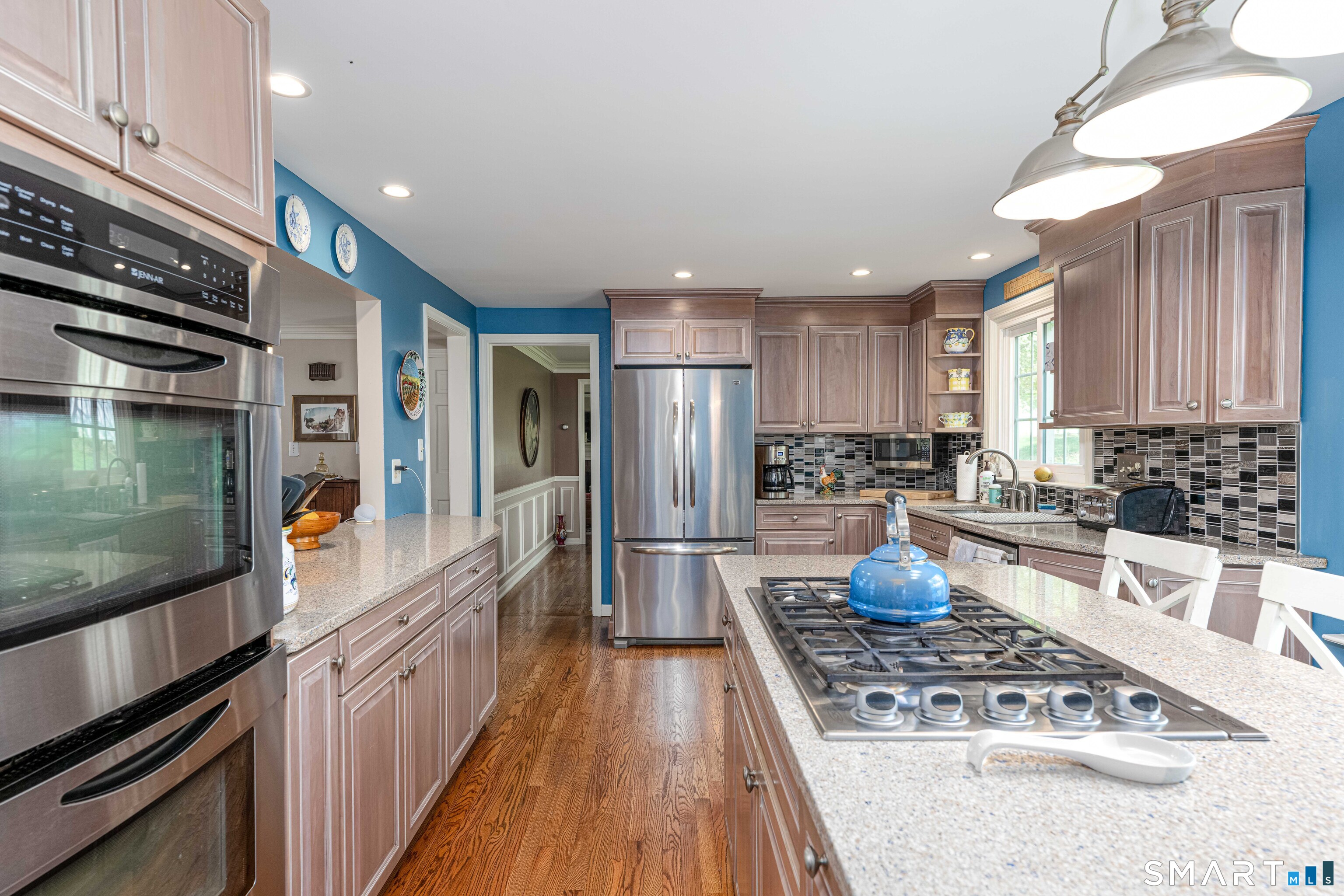 118 Rolling Ridge Road Hamden, CT 06518 - Photo 9 of 21 a kitchen with stainless steel appliances granite countertop a stove and a refrigerator