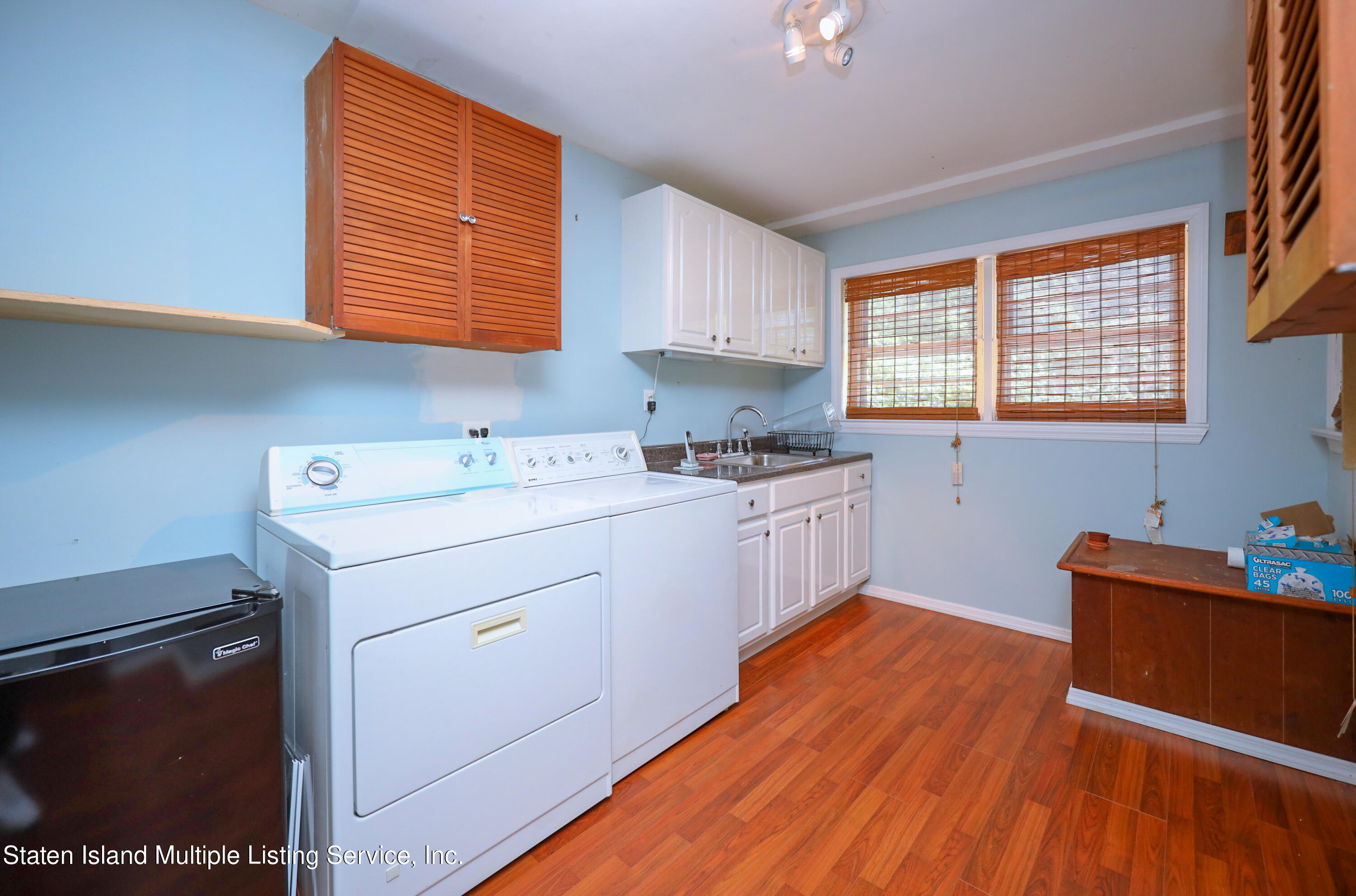 2209 Clove Road Staten Island, NY 10305 - Photo 21 of 38 a room with storage and utility
