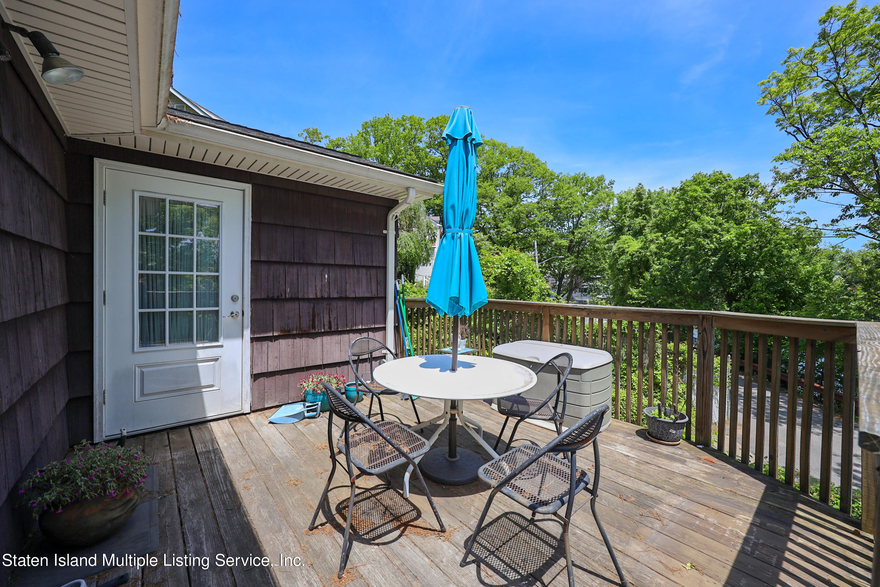 2209 Clove Road Staten Island, NY 10305 - Photo 29 of 38 a view of a table and chair in the balcony