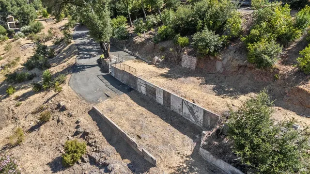 a view of a yard with wooden stairs