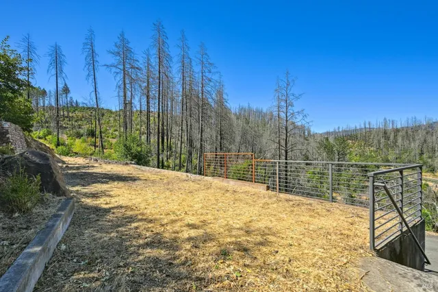 a view of swimming pool with a patio
