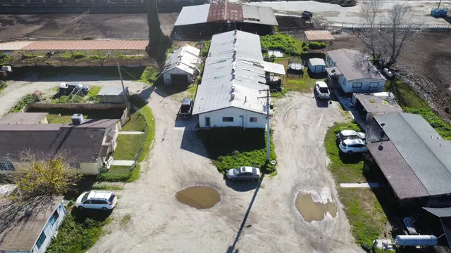 an aerial view of a house with a garden