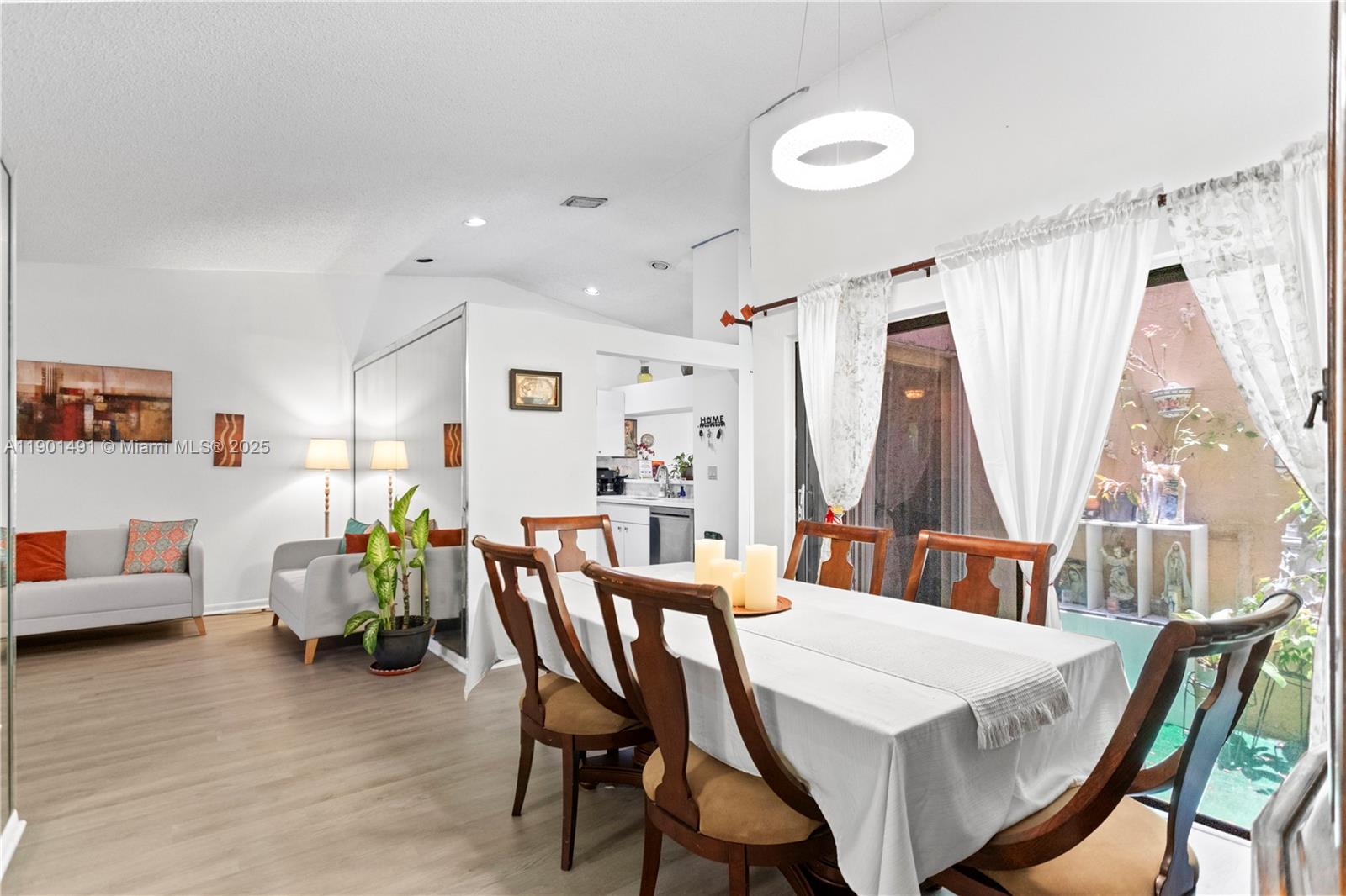 17320 Northwest 66th Place Hialeah, FL 33015 - Photo 18 of 47 a view of a dining room with furniture and a window