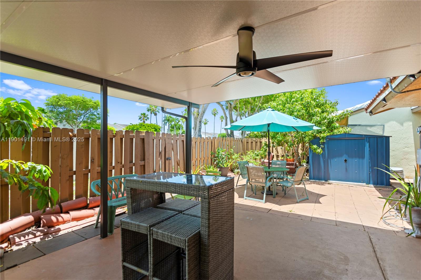 17320 Northwest 66th Place Hialeah, FL 33015 - Photo 35 of 47 a outdoor space with furniture