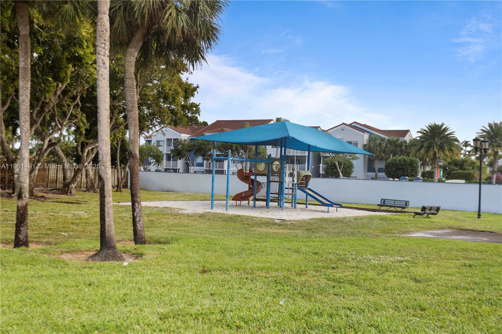 17320 Northwest 66th Place Hialeah, FL 33015 - Photo 36 of 47 a view of a house with swimming pool and sitting area