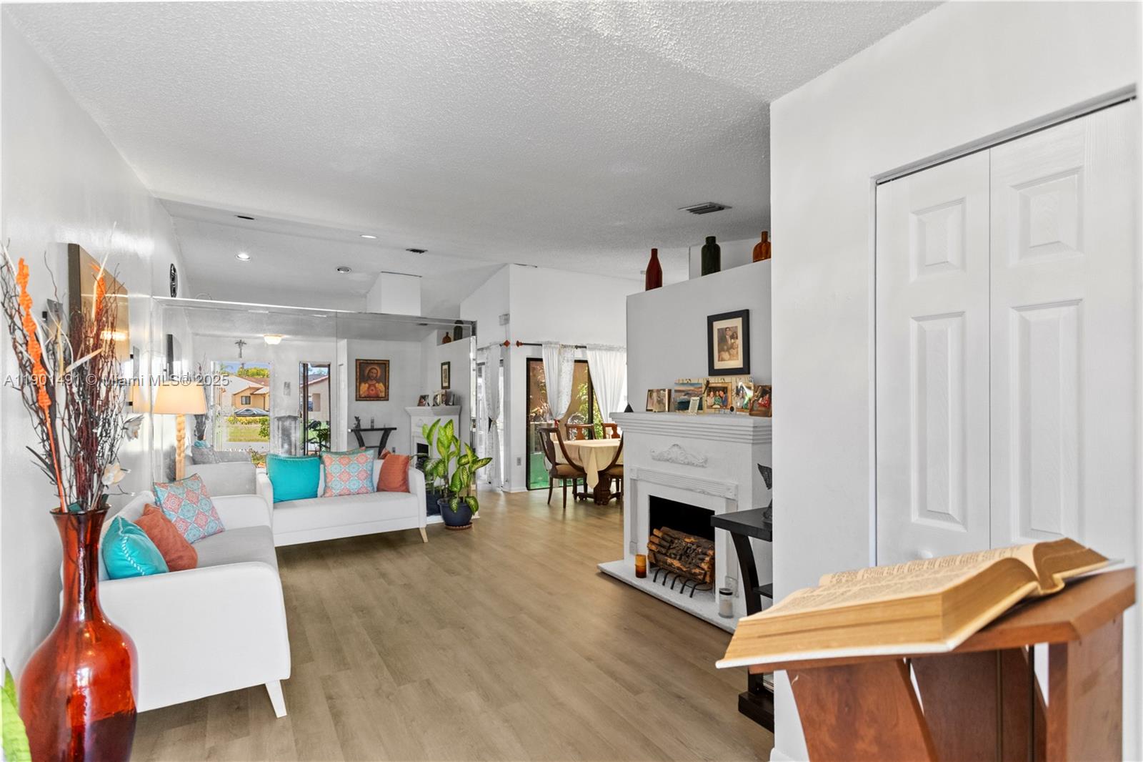 17320 Northwest 66th Place Hialeah, FL 33015 - Photo 8 of 47 a living room with furniture and a wooden floor