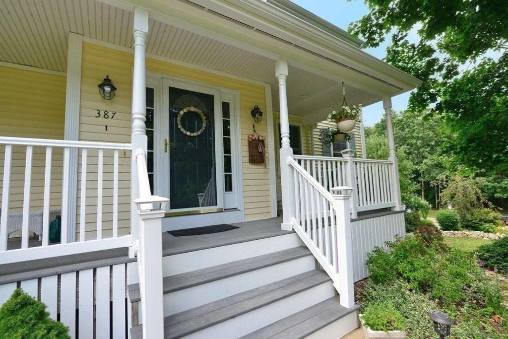 387 High Street Rochester, MA 02770 - Photo 1 of 39 a view of a house with a small porch