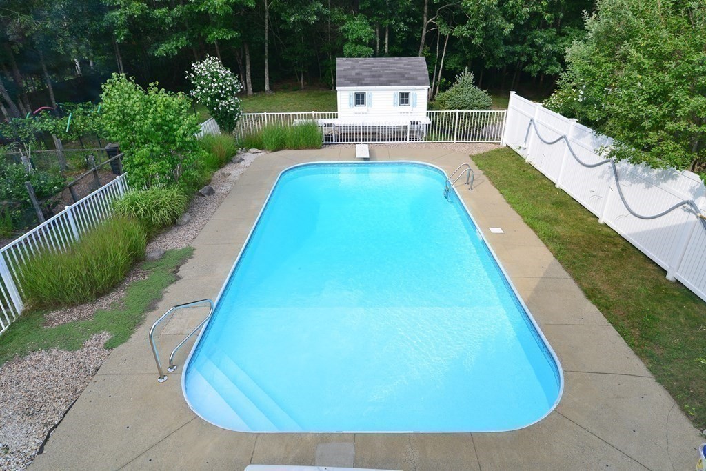 387 High Street Rochester, MA 02770 - Photo 4 of 39 a view of swimming pool with a lounge chair