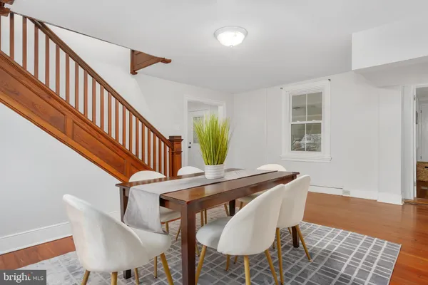 a bathroom with a sink and a window