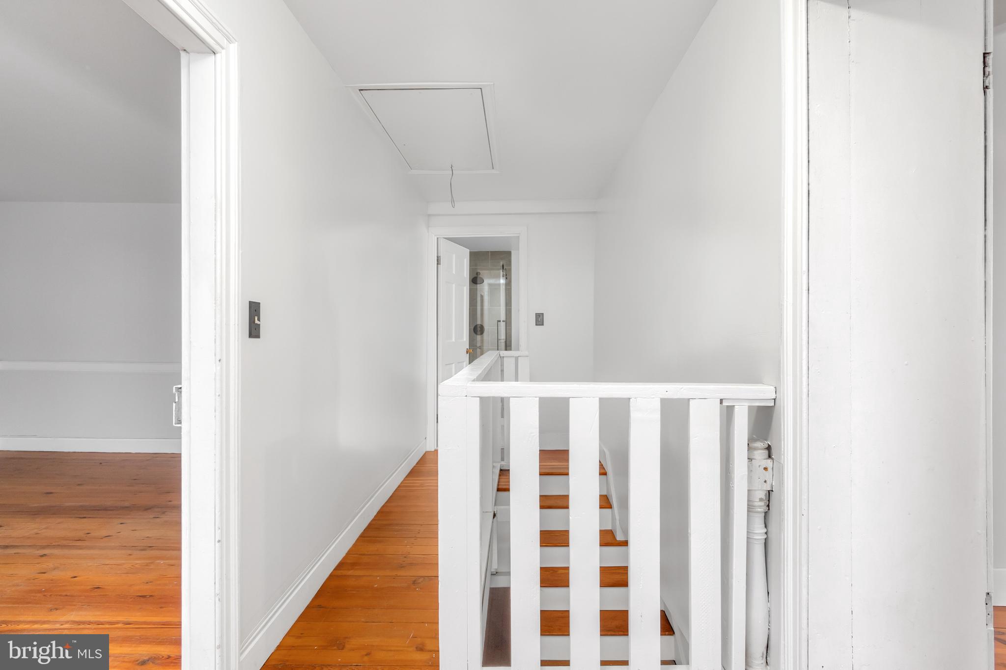 2730 Marker Road Middletown, MD 21769 - Photo 26 of 73 a view of a hallway with wooden floor and staircase