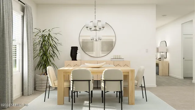 a kitchen with stainless steel appliances kitchen island granite countertop a table and chairs in it