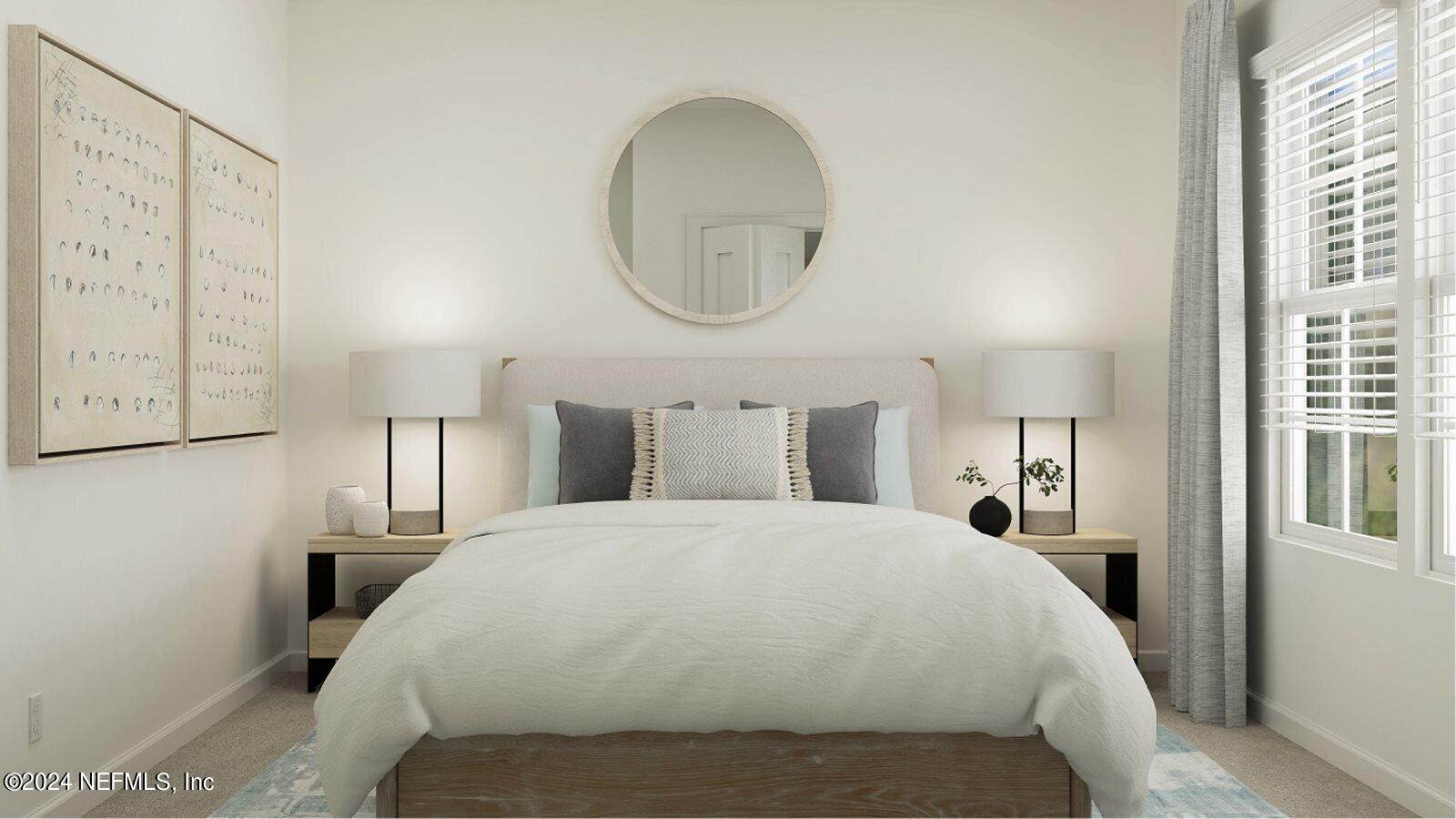 75729 Walking Path Lane Yulee, FL 32097 - Photo 29 of 40 a bedroom with a bed a mirror and wall painting