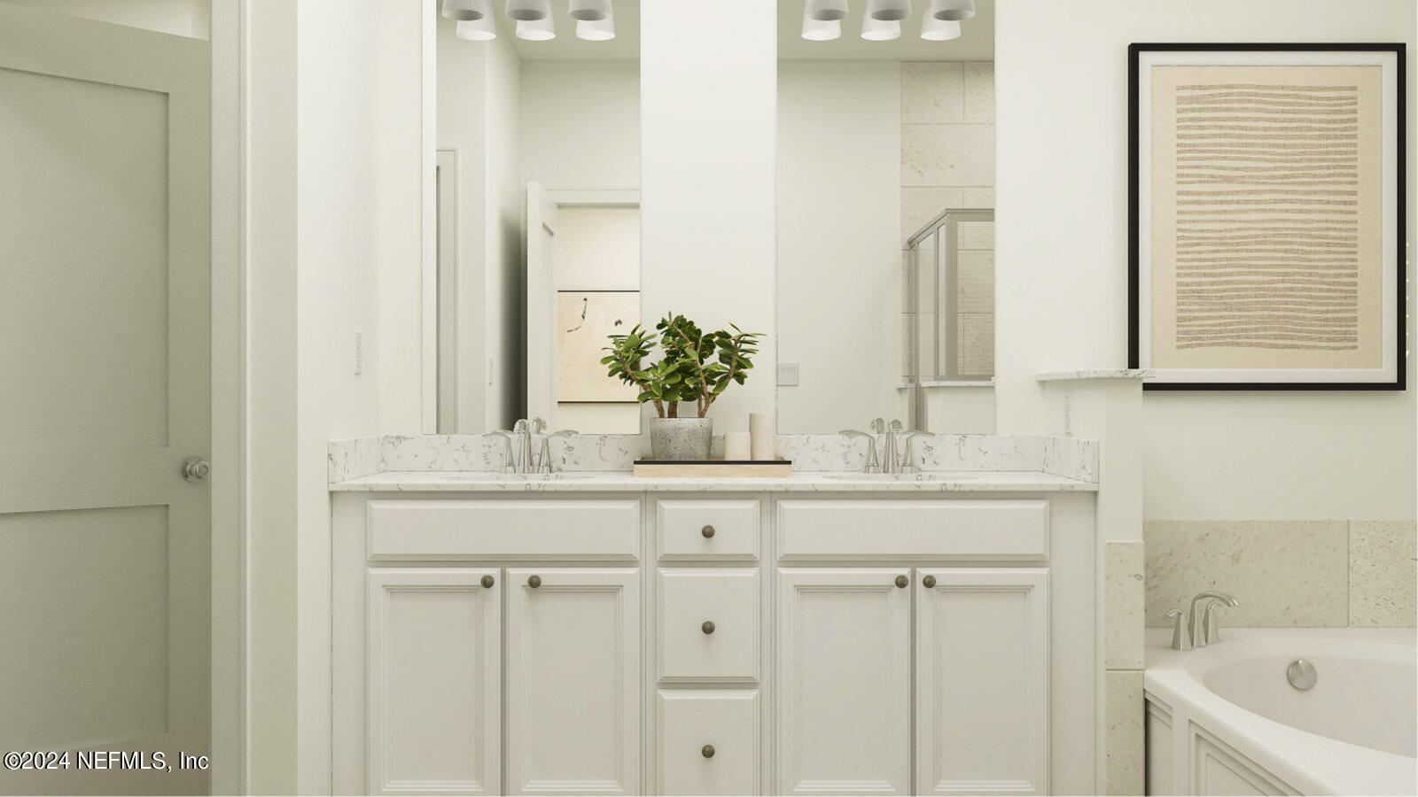 75729 Walking Path Lane Yulee, FL 32097 - Photo 37 of 40 a bathroom with a sink and a bathtub