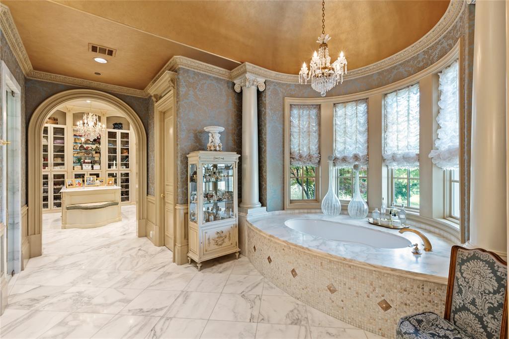 1201 Gray Branch Road McKinney, TX 75071 - Photo 18 of 40 a large spacious bathroom with a large tub and shower