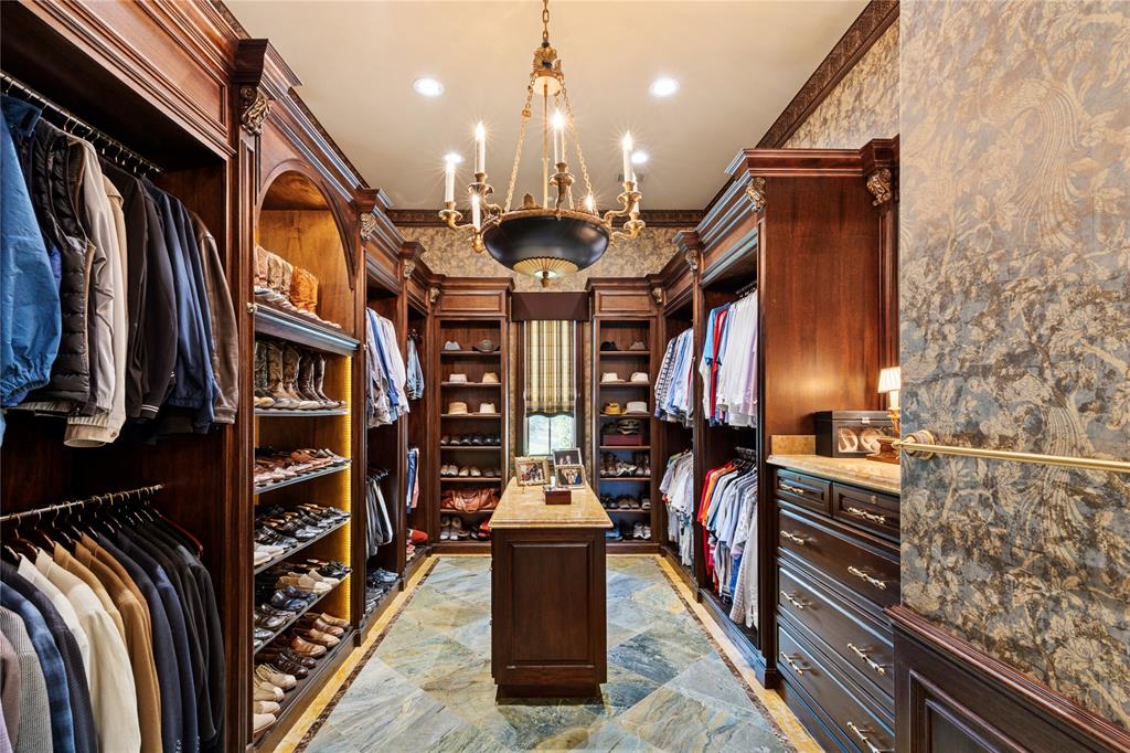 1201 Gray Branch Road McKinney, TX 75071 - Photo 21 of 40 a view of walk in closet with clothes and shoes