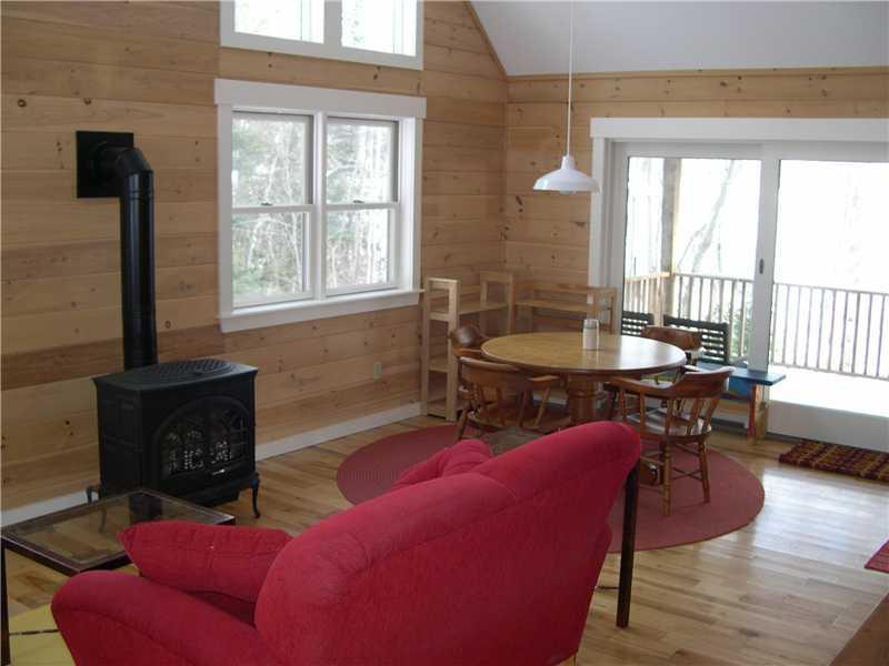 129 2 Rod Road Rangeley, ME 04970 - Photo 3 of 26 Living Room. Living/dining area with...