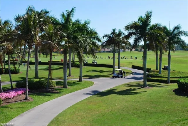 a view of a park with swings and slides