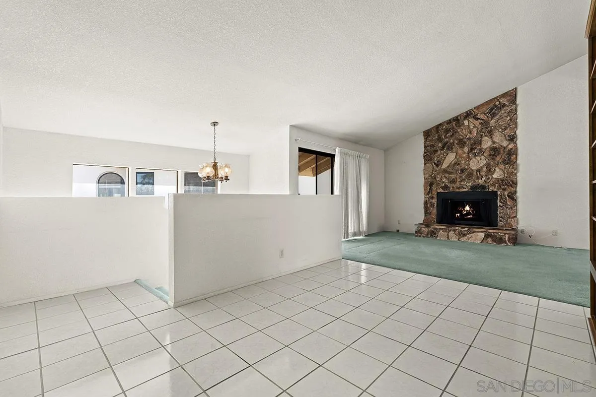 3344 Goldfinch Street San Diego, CA 92103 - Photo 11 of 41 a view of a livingroom with furniture and chandelier