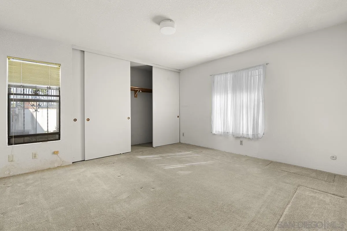 3344 Goldfinch Street San Diego, CA 92103 - Photo 26 of 41 an empty room with windows