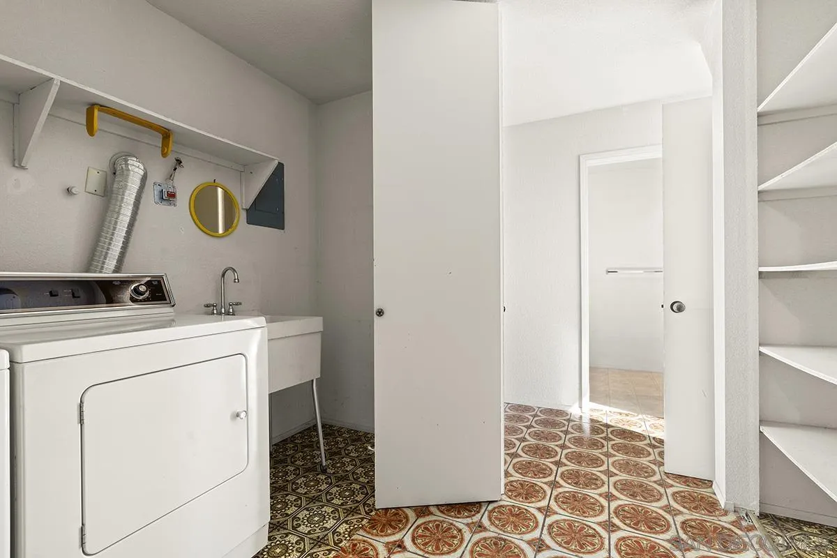 3344 Goldfinch Street San Diego, CA 92103 - Photo 33 of 41 a utility room with dryer and washer