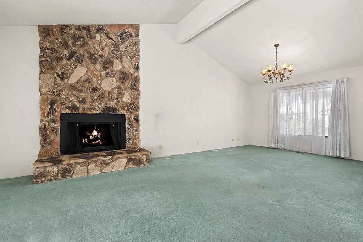 3344 Goldfinch Street San Diego, CA 92103 - Photo 8 of 41 a living room with a fireplace