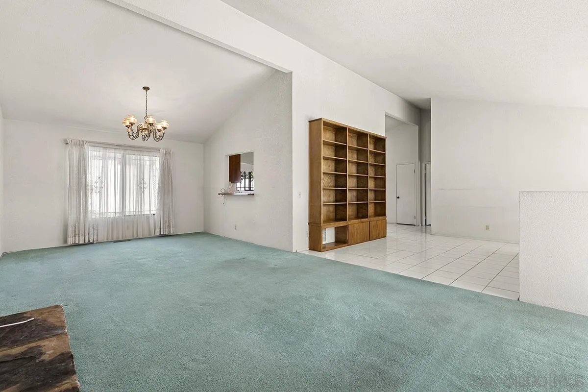 3344 Goldfinch Street San Diego, CA 92103 - Photo 10 of 41 an empty room with windows