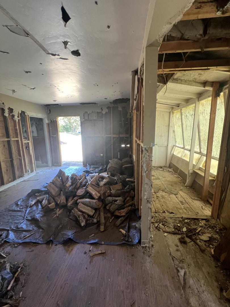 17160 Wilson Way Watsonville, CA 95076 - Photo 20 of 62 a bed room with a bed and a window