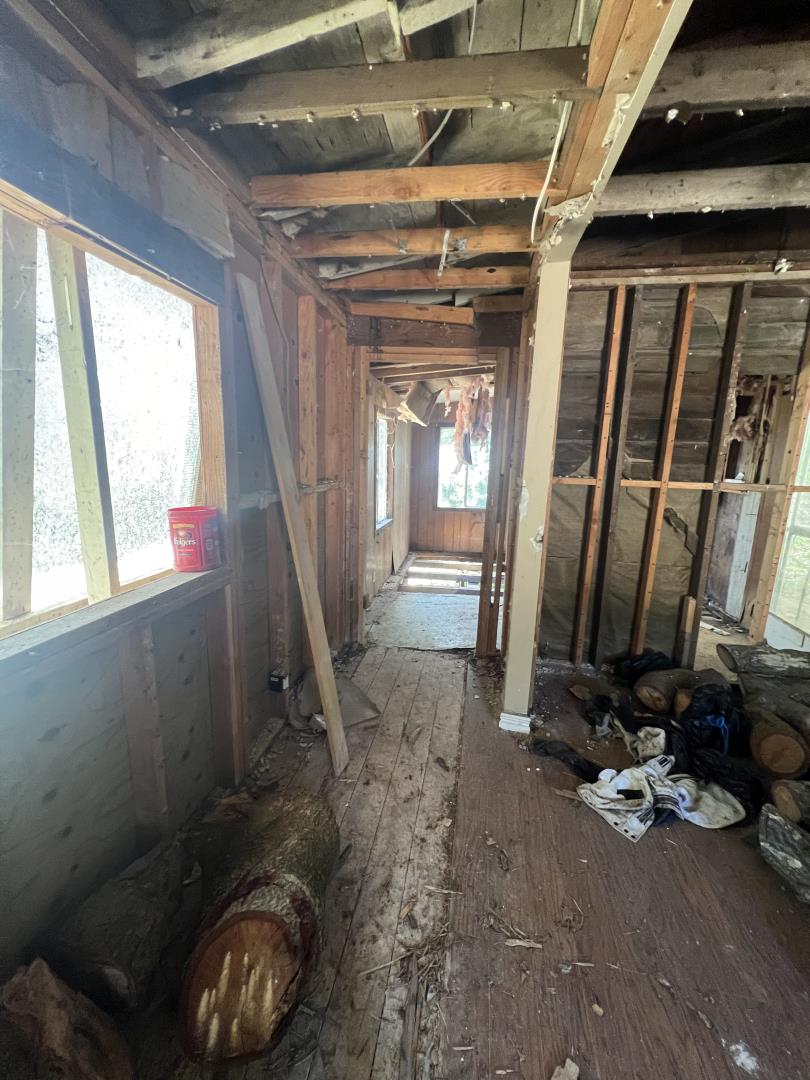 17160 Wilson Way Watsonville, CA 95076 - Photo 23 of 62 a view of a room with wooden floor and windows