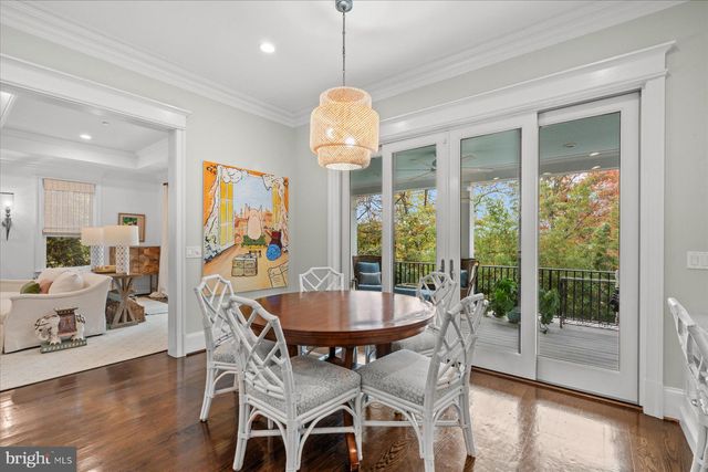 a spacious bedroom with a large bed and a large window