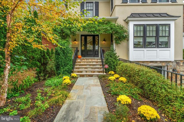 a view of kitchen with a window cabinets and a wooden floor