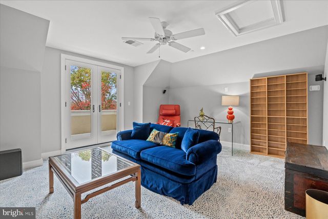 a front view of a building with glass windows