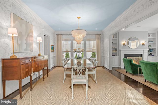 a kitchen with granite countertop a stove and a refrigerator