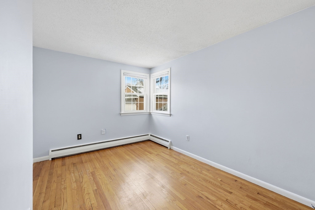 176 Silvin Road Chicopee, MA 01013 - Photo 18 of 32 an empty room with a window