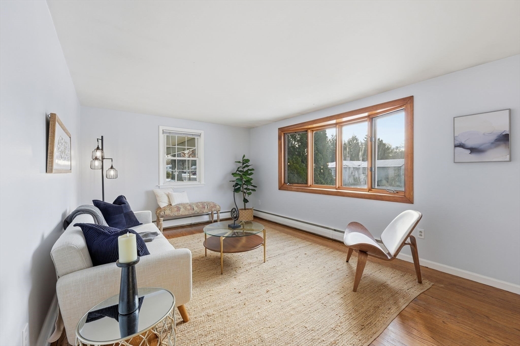 176 Silvin Road Chicopee, MA 01013 - Photo 5 of 32 a living room with furniture and a window