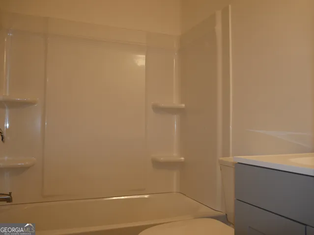 a bathroom with a bathtub