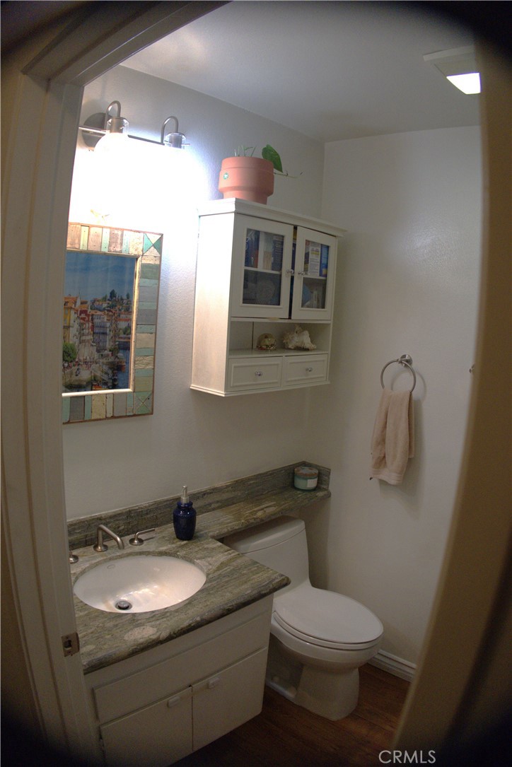 743 Calle Bahia San Clemente, CA 92672 - Photo 14 of 31 a bathroom with a toilet sink and mirror