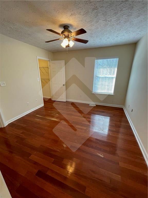 4267 Grogan Street Acworth, GA 30101 - Photo 22 of 37 a view of empty room with wooden floor