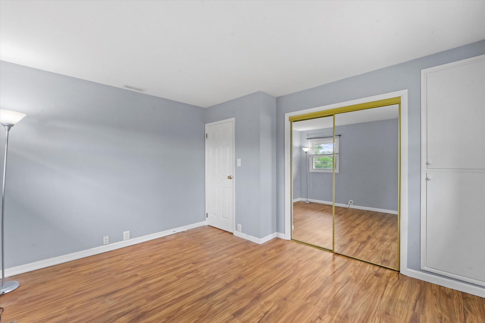 300 Hemlock Avenue Romeoville, IL 60446 - Photo 12 of 31 a view of wooden floor in an empty room
