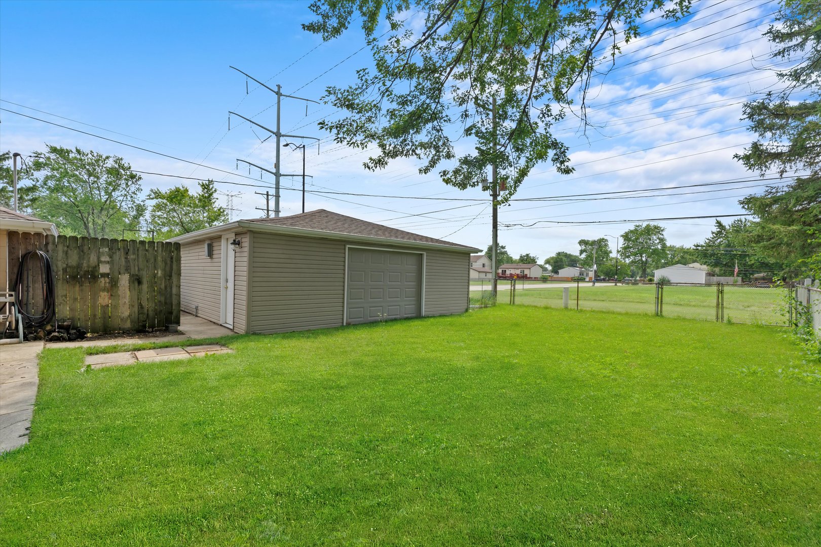 300 Hemlock Avenue Romeoville, IL 60446 - Photo 25 of 31 a backyard of a house with lots of green space