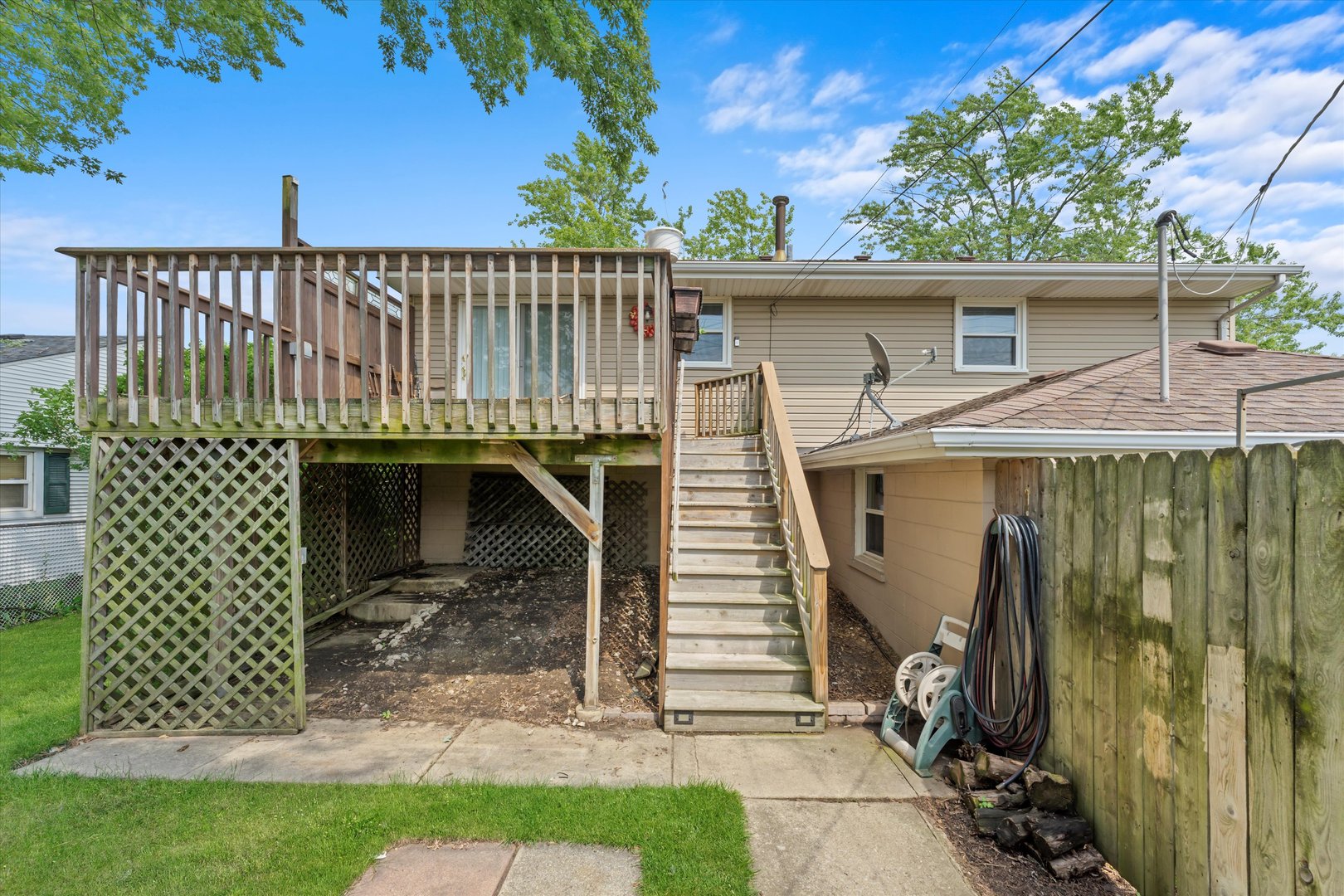 300 Hemlock Avenue Romeoville, IL 60446 - Photo 26 of 31 a view of a small house with wooden fence