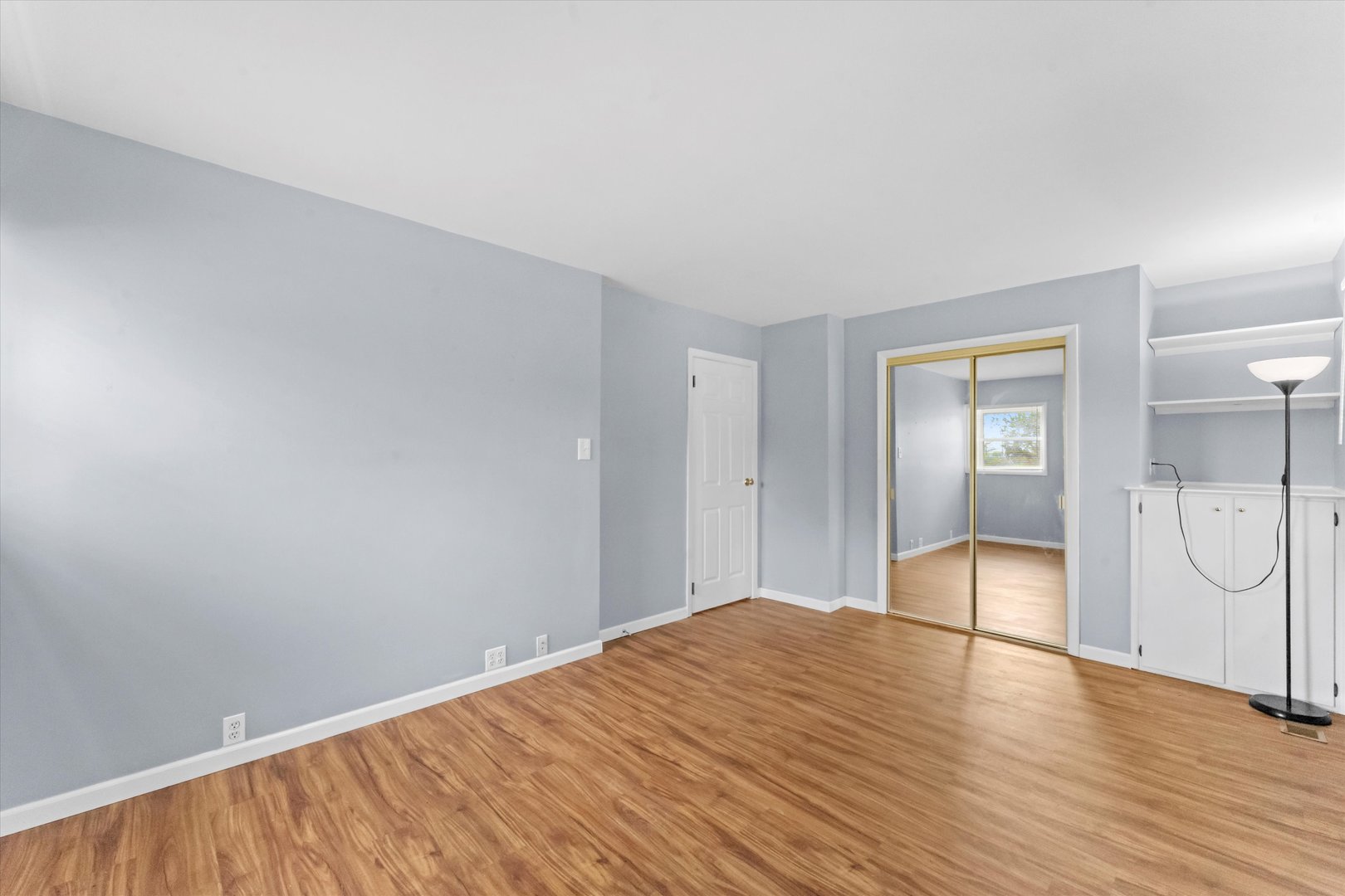 300 Hemlock Avenue Romeoville, IL 60446 - Photo 10 of 31 a view of empty room with wooden floor
