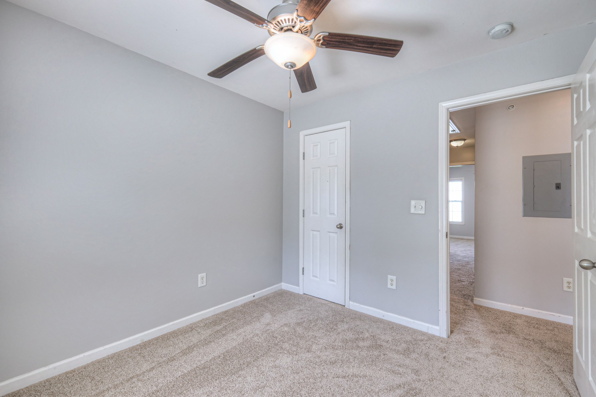 4027 Clinton Lane Spring Hill, TN 37174 - Photo 11 of 25 an empty room with closet and a chandelier fan
