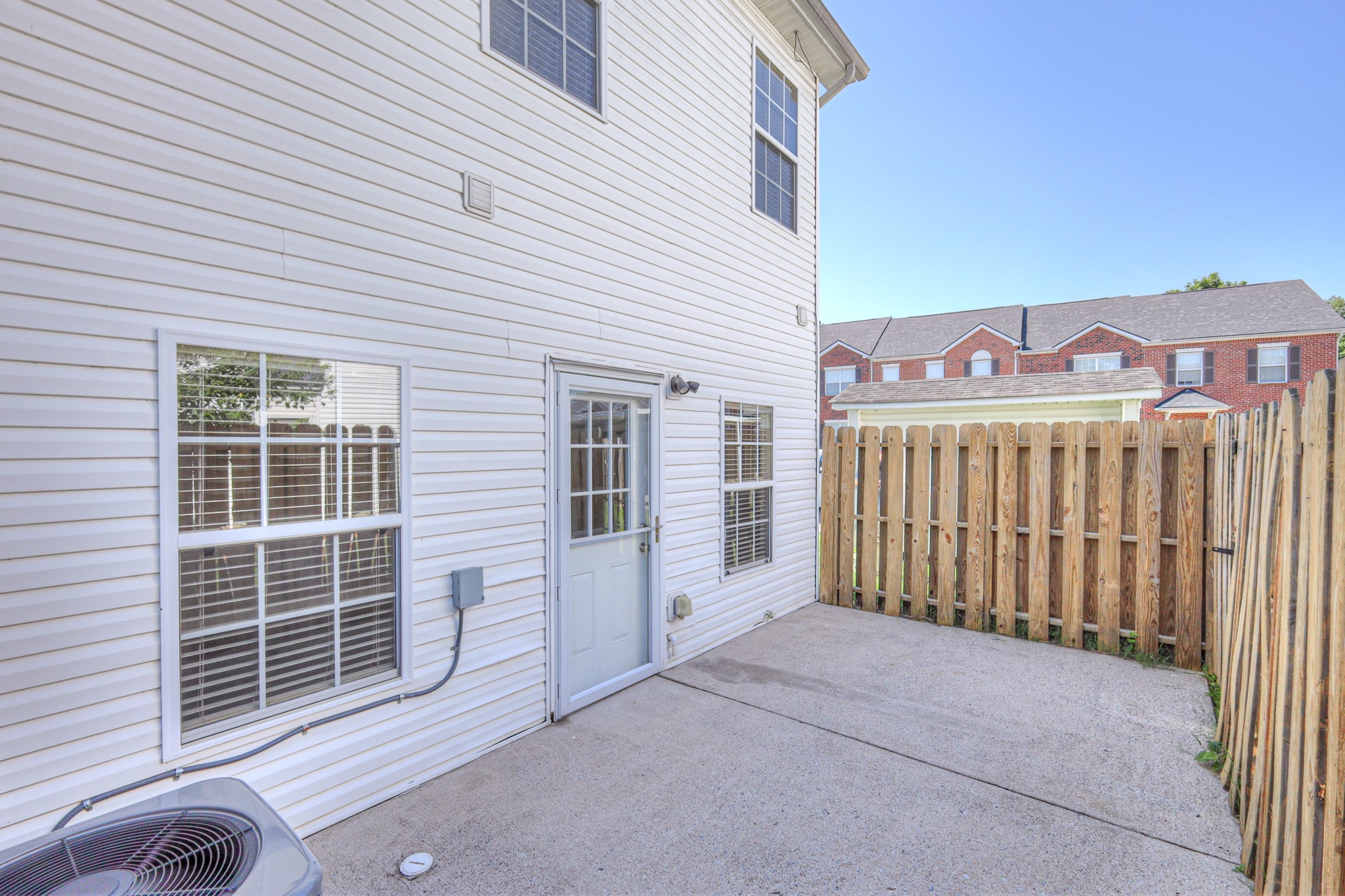4027 Clinton Lane Spring Hill, TN 37174 - Photo 19 of 25 a view of a house with a door and a window