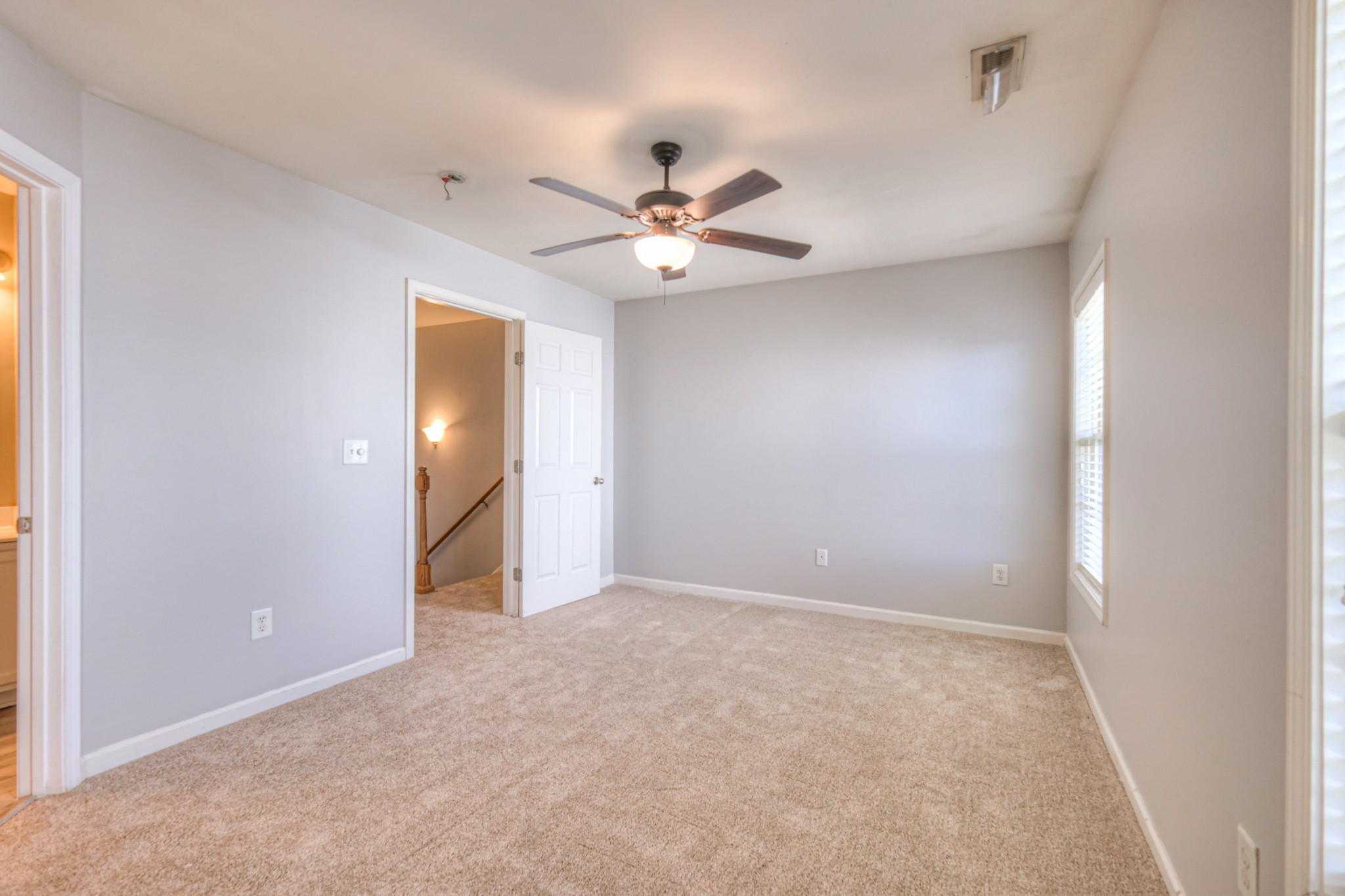 4027 Clinton Lane Spring Hill, TN 37174 - Photo 8 of 25 an empty room with closet and a ceiling fan