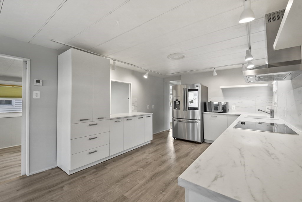 40 Eldorado Drive Marlborough, MA 01752 - Photo 11 of 26 a kitchen with stainless steel appliances a refrigerator and a sink