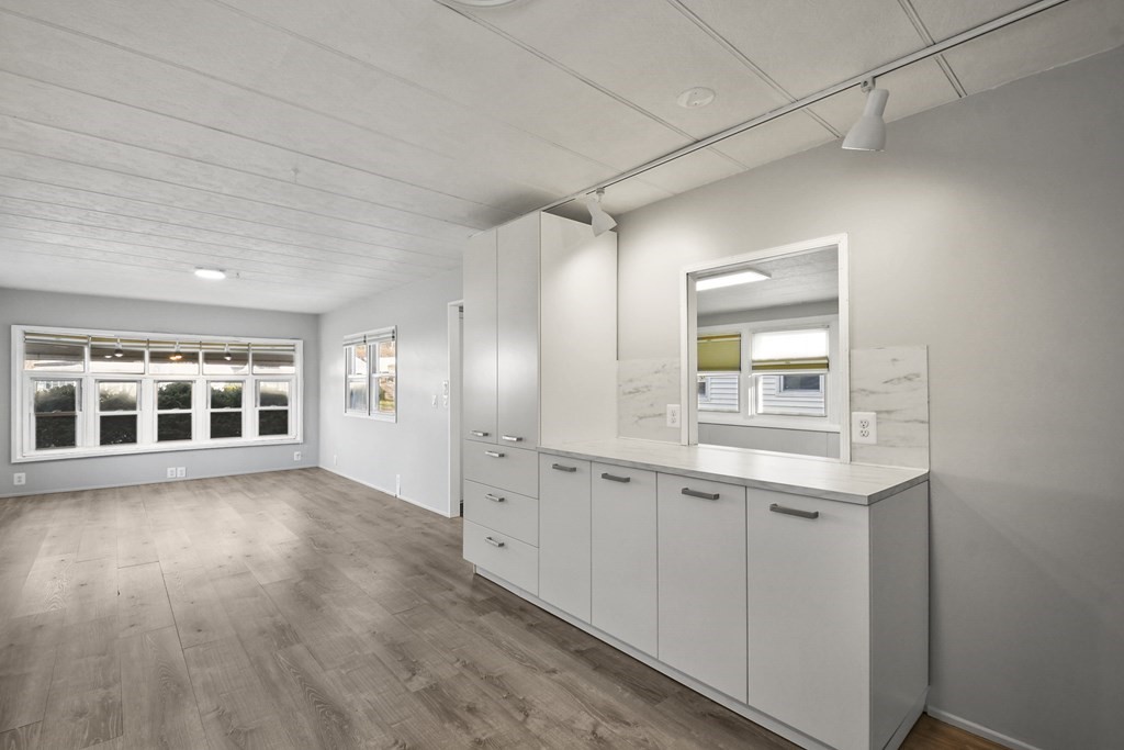 40 Eldorado Drive Marlborough, MA 01752 - Photo 13 of 26 a view of empty room with wooden floor and window